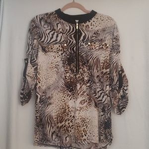 Animal print, half zip blouse